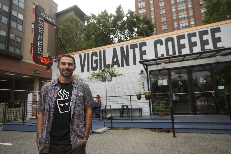 Chris Vigilante in front of one of his coffee shops in College Park, Maryland, in September 2021.