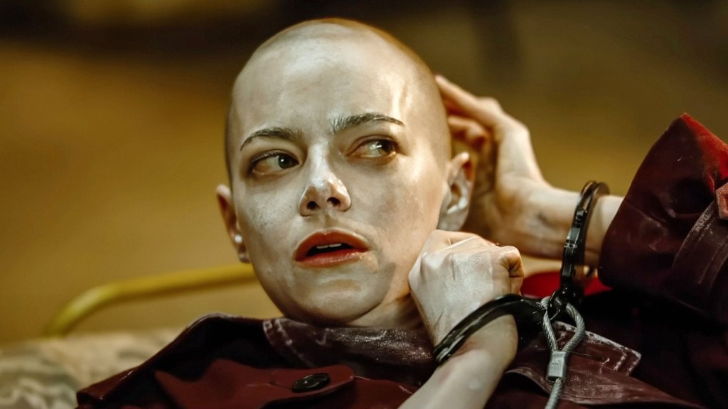 ‘Bugonia’s Emma Stone On Why She Was “So Afraid” To Shave Her Head
