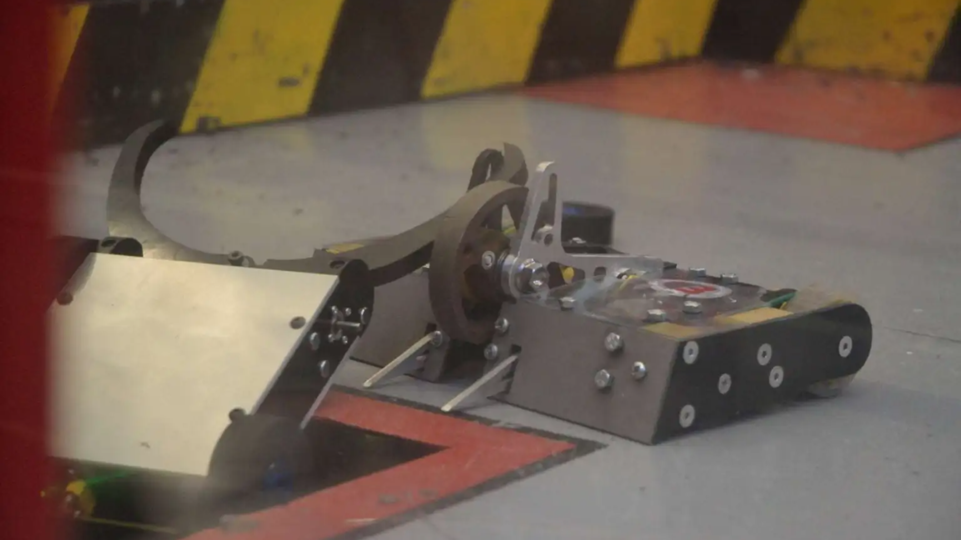 Nearly 50 miniature bots fight at UK championship event
