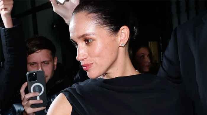 Meghan left red-faced after friend reveals truth about Paris Fashion Week invite