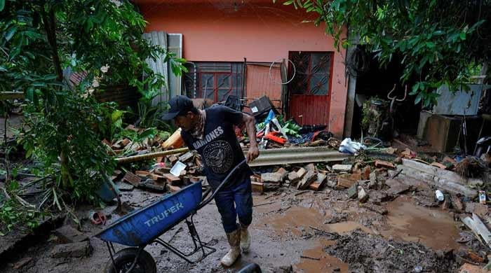 Heavy rains flood Mexico towns, leave nearly 130 dead or missing