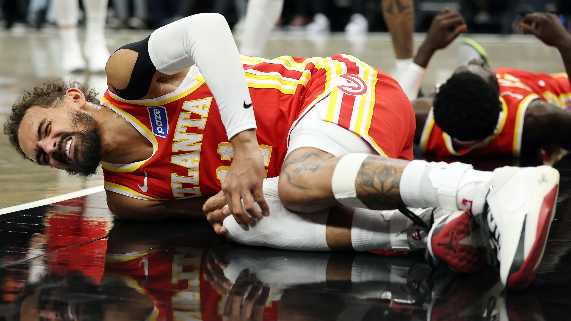 Hawks’ Trae Young suffers sprained right knee vs. Nets