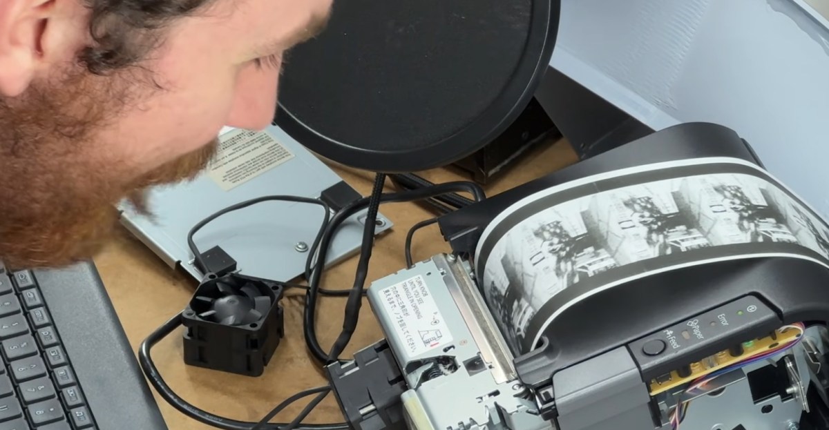 Playing Doom using a printed receipt as your screen is utterly chaotic.