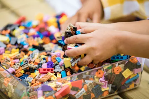 Daniel Knighton/Getty Images Children learn to assemble LEGO bricks during the Master Model Builder Show at LEGO Festival Media Day at LEGOLAND California on May 03, 2025 in Carlsbad, California