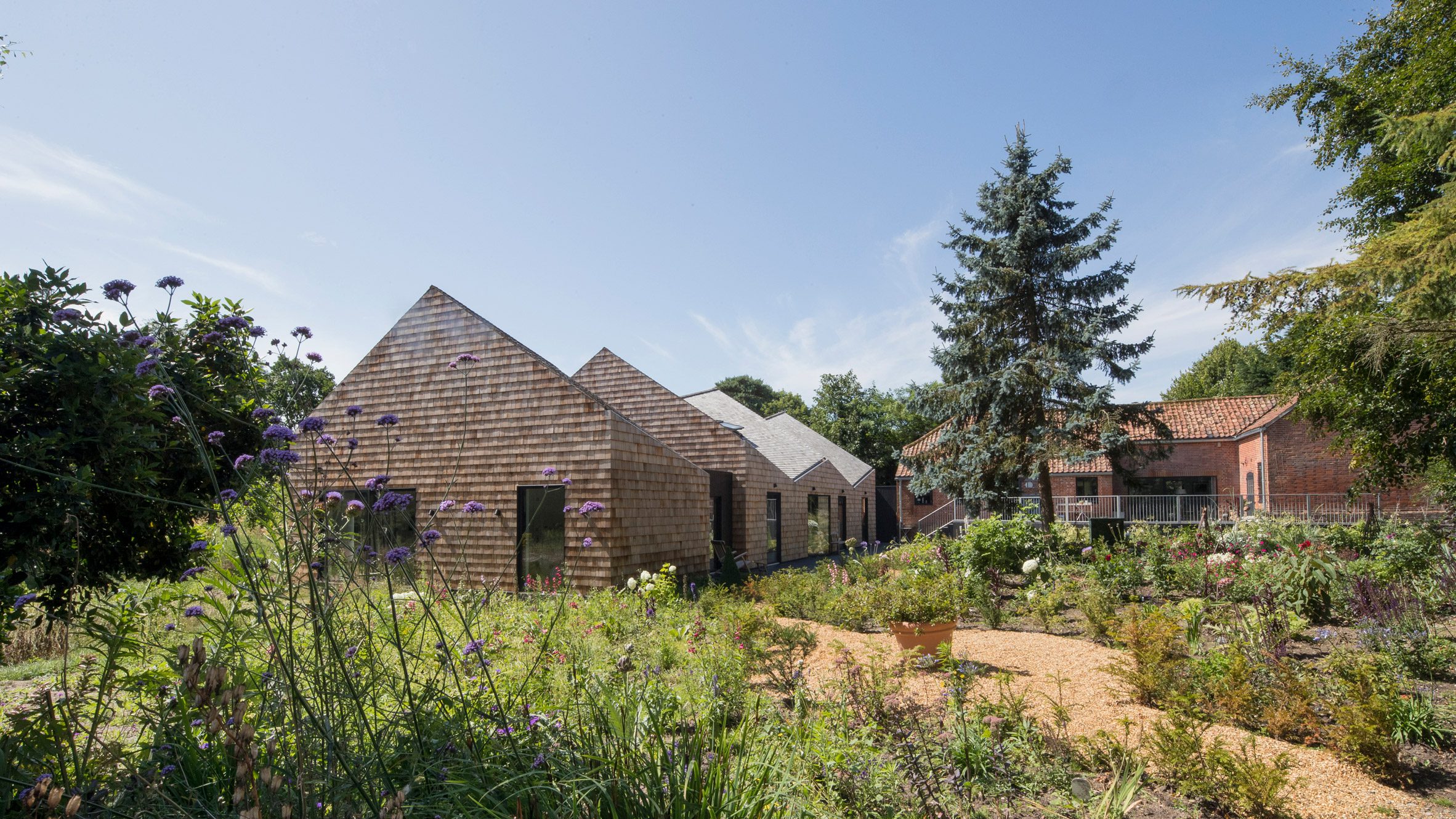 Seven scaly-looking houses that are sheathed in shingles