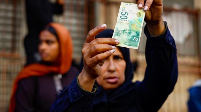 As guns fall silent, Gazans find newly reopened banks with no cash