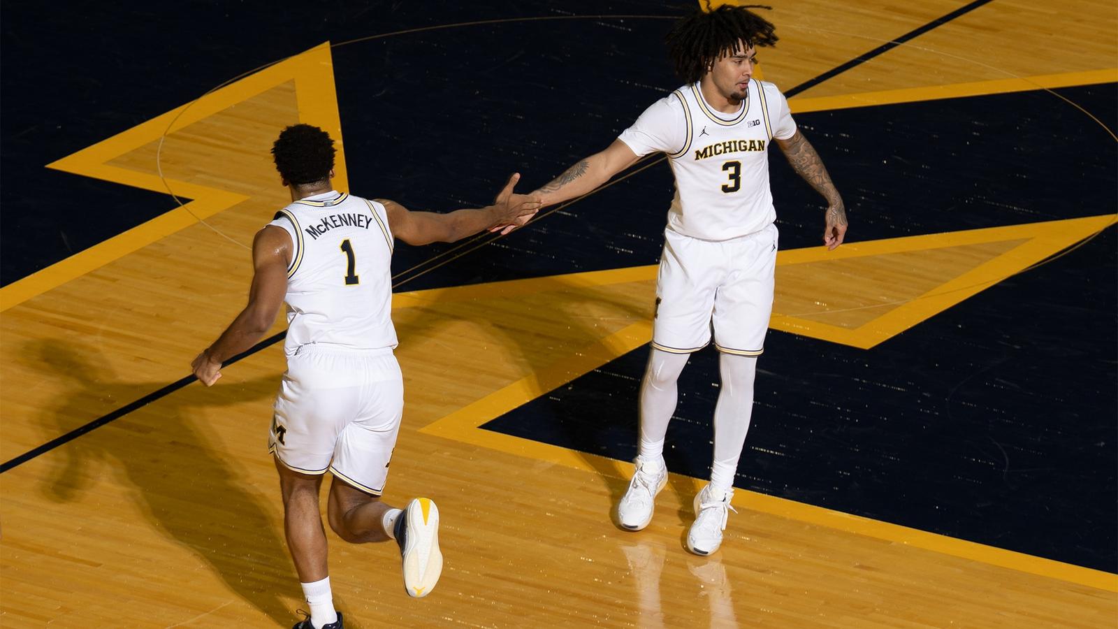 McKenney Leads Wolverines in Holiday Hoops Double-Header