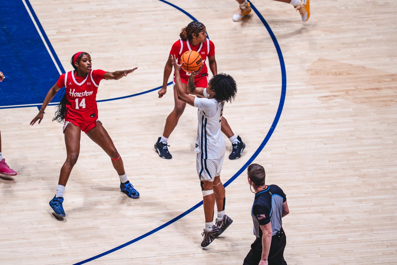 West Virginia Breaks Century Mark in Big 12 Opener Against Houston