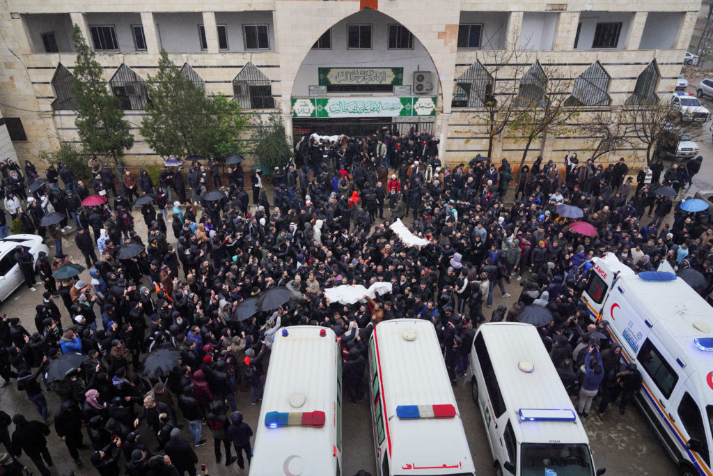 Mourners gather in Syrian city of Homs for victims of deadly mosque bombing