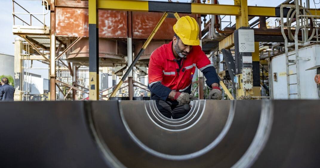 Iranian workers and consumers to bear cost of budget deficit, experts warn