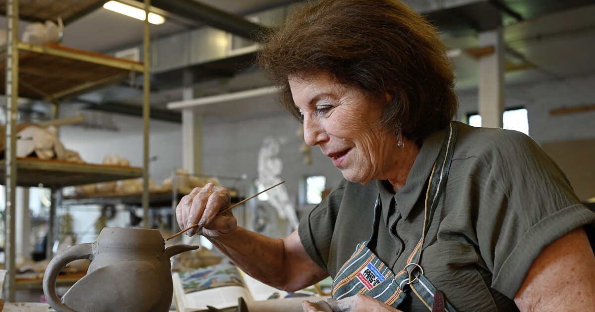 A Kansas City artist crafts fashion — and guns — out of ceramic. Her provocative career gets a new look | KCUR