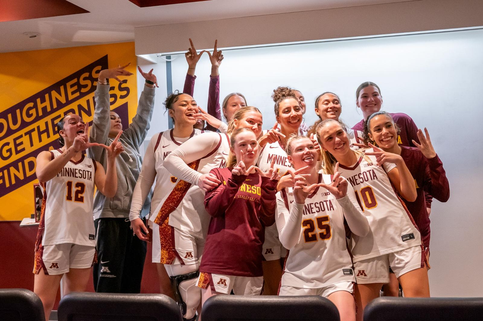 Minnesota Tops No. 21 USC 63-62