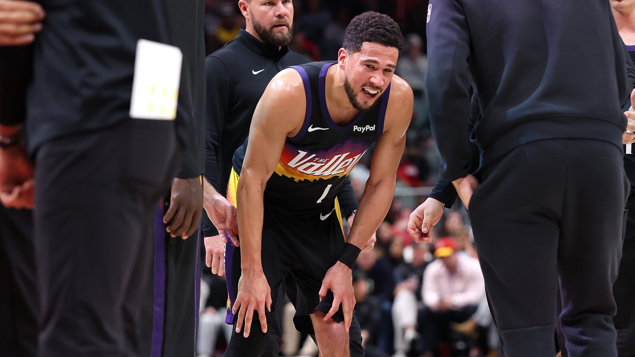 Suns’ Devin Booker exits with ankle injury vs. Hawks