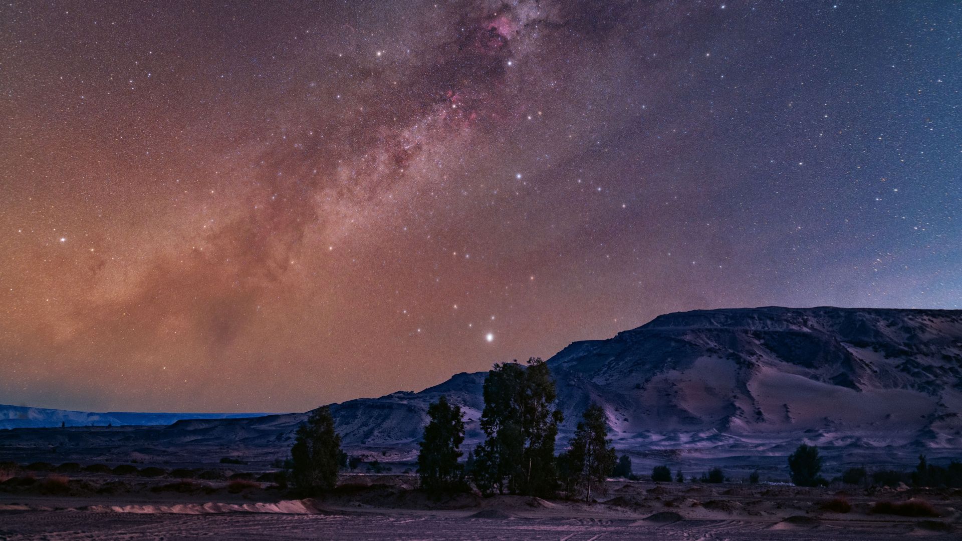 See the Milky Way glow with the stars of the Summer Triangle above Egypt’s Black Desert