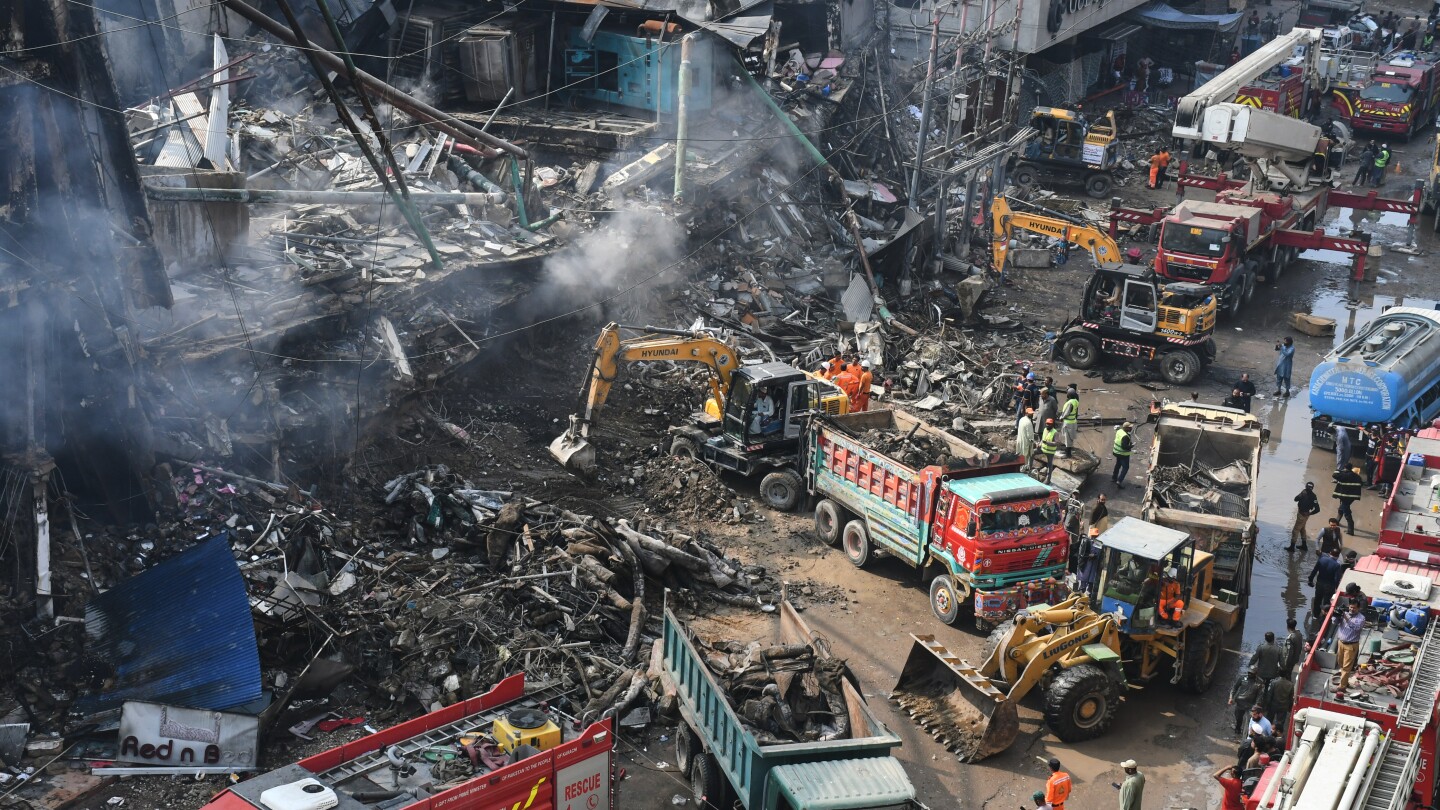 Karachi mall fire death toll rises to 23 as rescuers search for dozens missing