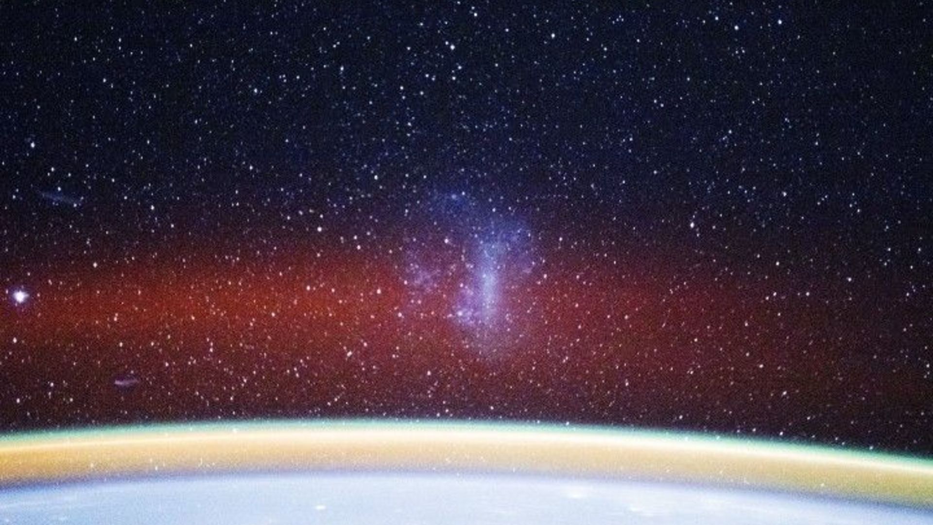 ISS astronauts spy airglow and dwarf galaxy photo of the day for Jan. 13, 2026