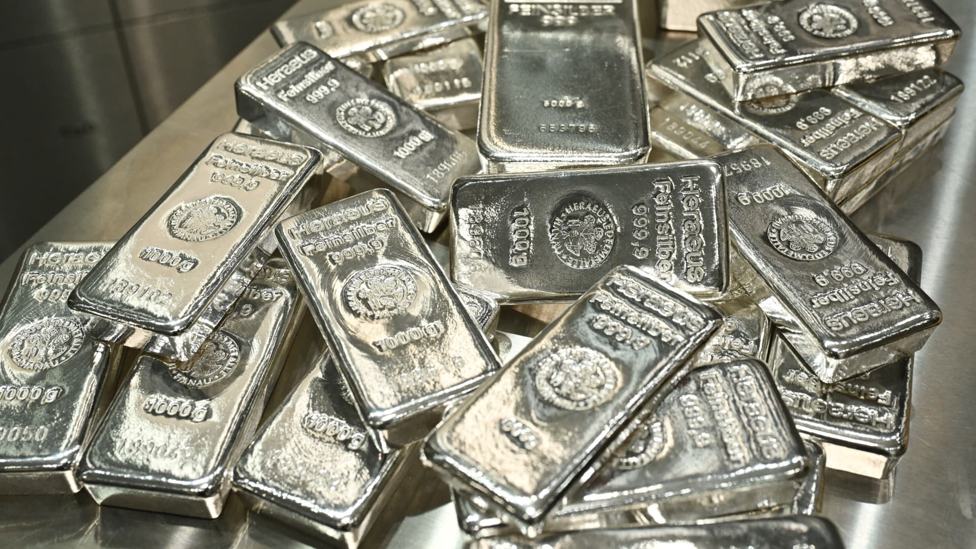 Silver resumes its slide, plunging 13%, after short-lived rebound