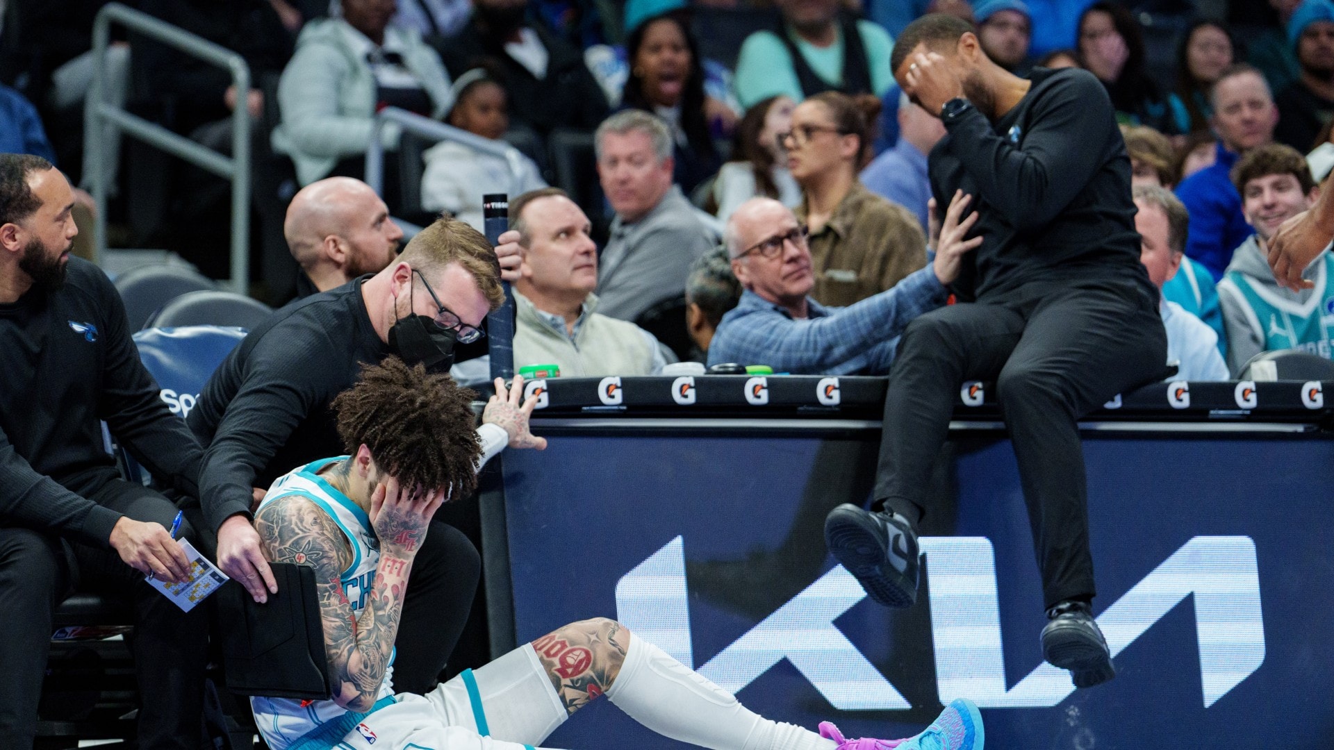 Coach Charles Lee and LaMelo Ball collide on sideline