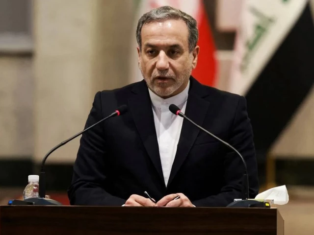 Iran FM looks to more nuclear talks, but warns US against any attack