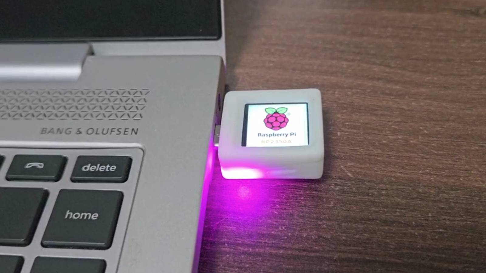 The HackyFi is a USB-C dongle with a tiny screen that runs off a Raspberry Pi