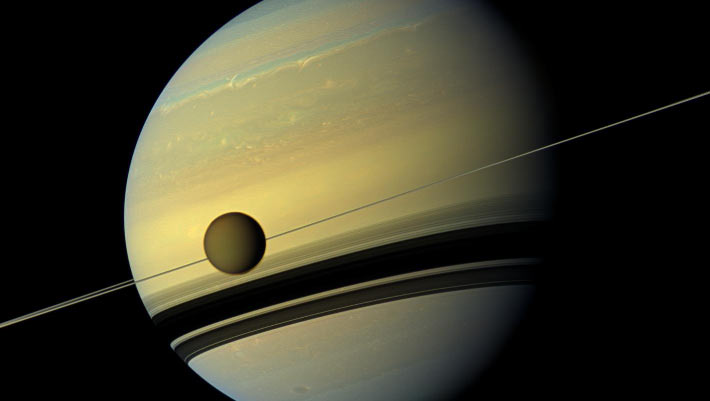 Saturn’s Ring System, Hyperion and Titan May Have Originated in Collision of Two Proto-Moons