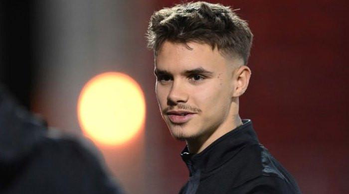 Romeo Beckham showsoff new ‘family’ tattoo amid Brooklyn turmoil