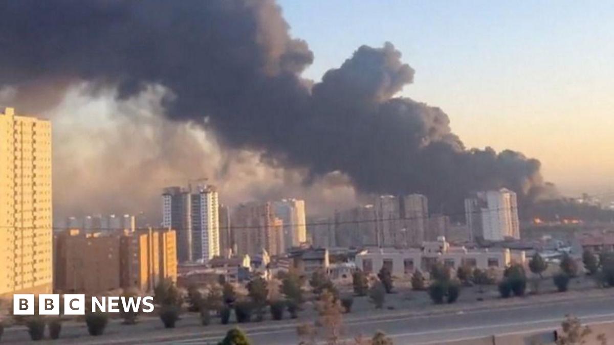 Israel attacks security headquarters across Tehran, as Iran hits US sites in Dubai and Qatar