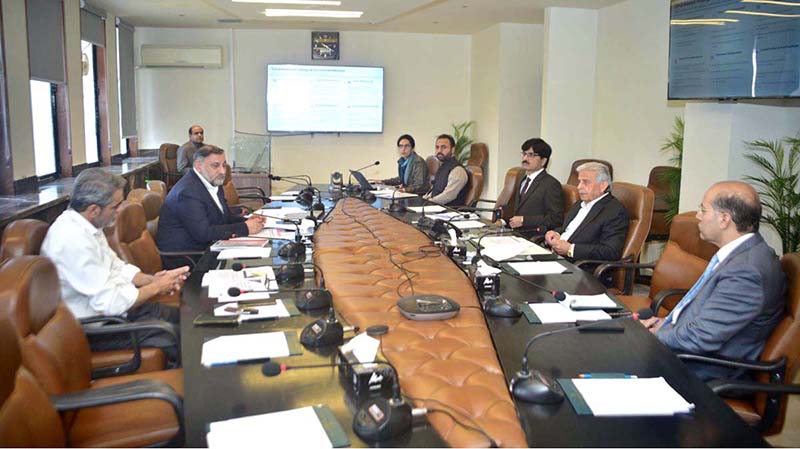 Federal Minister Rana Tanveer Hussain with PARC Chairman Dr. Syed Murtaza Hassan Andrabi at a meeting on national agricultural research reform. – | Associated Press Of Pakistan