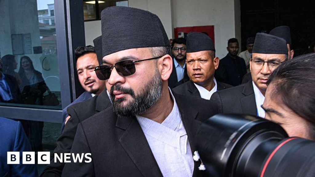 Nepal swears in ex-rapper as new prime minister – BBC