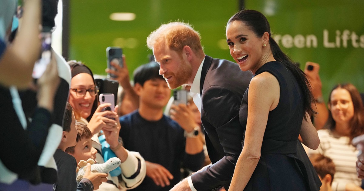 Prince Harry and Meghan arrive in Australia to a muted welcome