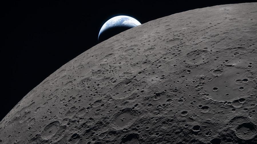 Artemis II crew heads back from Moon as NASA releases first flyby photographs