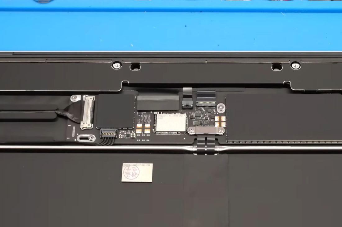 Upgrading A MacBook Neo Using A 1 TB IPhone NAND Flash